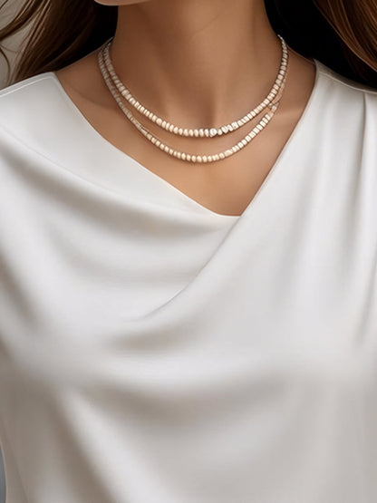 Elegant Plain Short-Sleeve Blouse with Draped Neckline