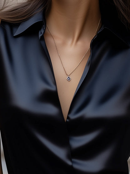 Sleek Black Satin Sleeveless Blouse